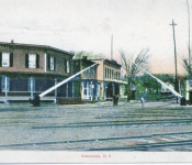 This is a good color rendition of the crossing showing the Shoudy House, the Enders store and the Central House.