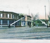 This is a good color rendition of the crossing showing the Shoudy House, the Enders store and the Central House.