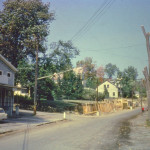 Looking north on North Main St. at the intersection of Maple Ave (currently Thousand Acre Rd. The Post Office and Carroll's Store on the left. Florence Jackson's house on the right. 18