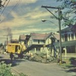 Looking north on North Main. Getting ready to remove a tree stump in front of the Meyers home. 24
