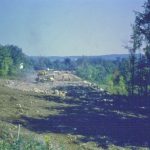 Looking Northeast on 395. The future School Drive on the left. This section of 395 was created to bypass the high school. See next photo of map. Looking Northeast on 395. The future School Drive on the left. This section of 395 was created to bypass the high school. See next photo of map.