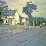 Looking north on South Main Street at the corner of East and West Shore Roads. Standing in front of the Telephone Company building. 5