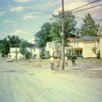 Same location with the trees removed. Here you can see the Drinon house, currently the Mackie home at the far right. Standing in front of the Methodist Church. 9