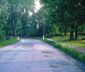 On Main Street, looking south, Grenier’s on right, Edwards’ (currently O'Connor's) straight ahead. M-1
