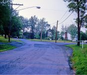 Starting up School Drive, Barber Shop on right opposite the Duanesburg H.S. M-10