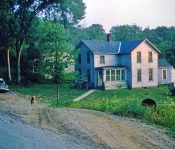 Looking southwest from 395 at Lottie Bradt's house and the Youngs house rented by Harold Bradt in the background. This was located south of the current Risley property. M-34