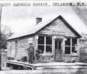 Harness Shop and news room operated by James Paige on south Main street right next to the creek where gazebo is located. Courtesy of the Duanesburg Historical Society,