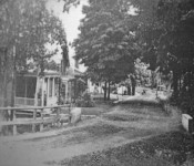 Picture taken near the stream on Main street just south of the high school. The O'connor house would be on the right. North Main