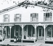Rector Building located on Main Street opposite the Fire House. Fred Alexander did business on the left side, the post office was on the right side and there was a hall upstairs for public gatherings. Courtesy of the Duanesburg Historical Society.