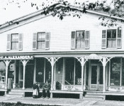 Rector Building located on Main Street opposite the Fire House. Fred Alexander did business on the left side, the post office was on the right side and there was a hall upstairs for public gatherings. Courtesy of the Duanesburg Historical Society.